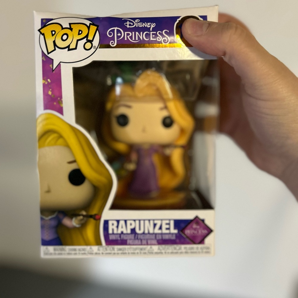 Funko Disney Princess Rapunzel Figure in Purple and Yellow